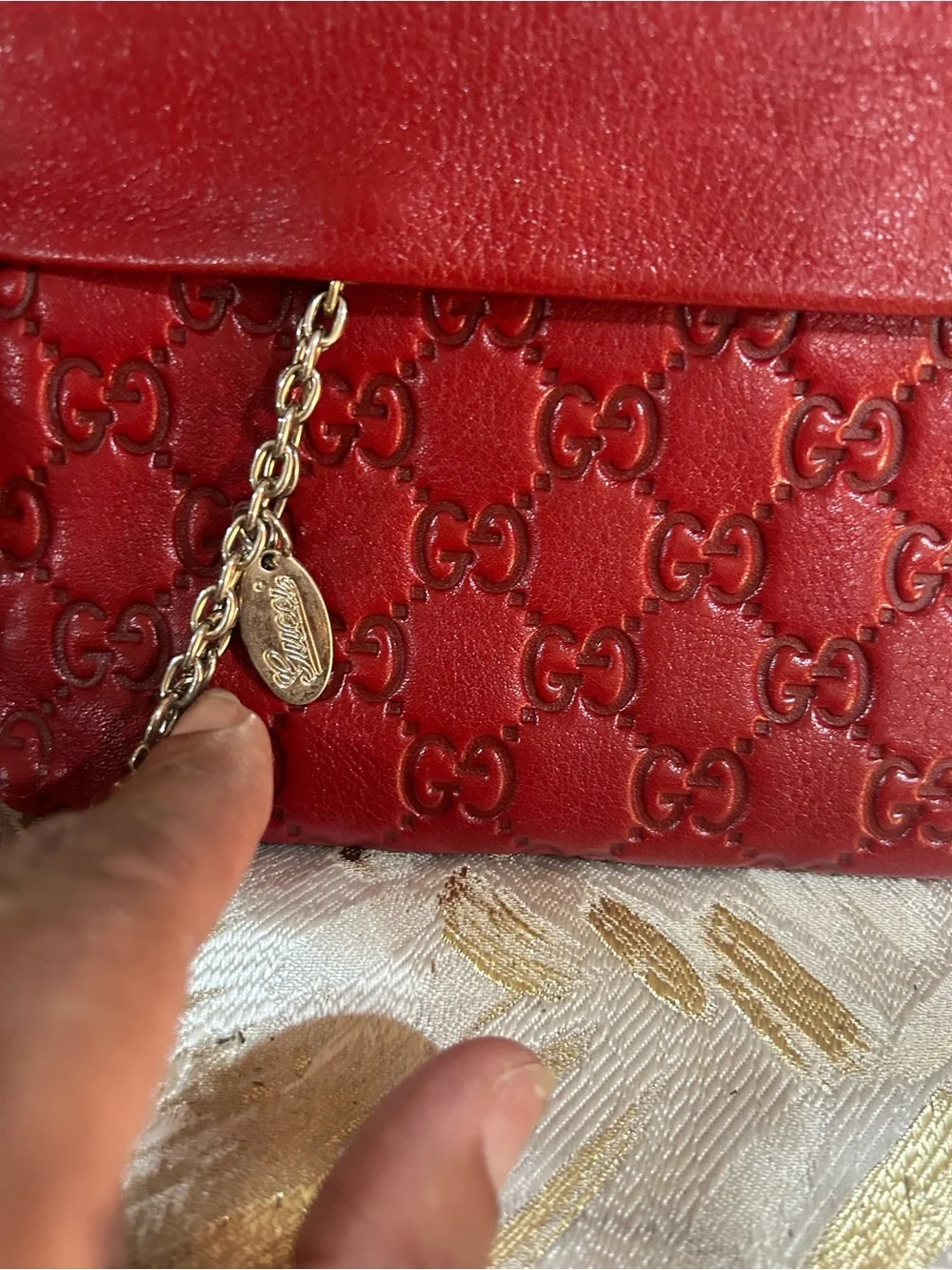 Vintage GG Red Embossed GG Leather Wristlet with Silver Chain Charm